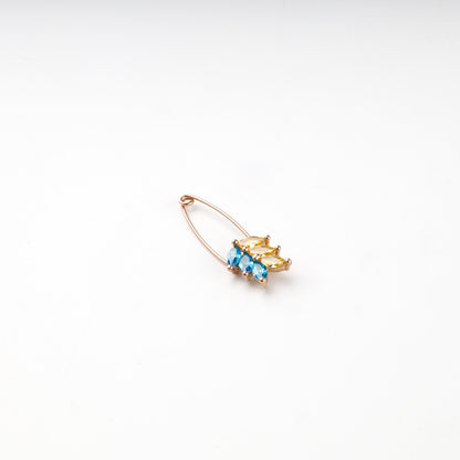 Blue and yellow marquise zirconia wheat motif, close view