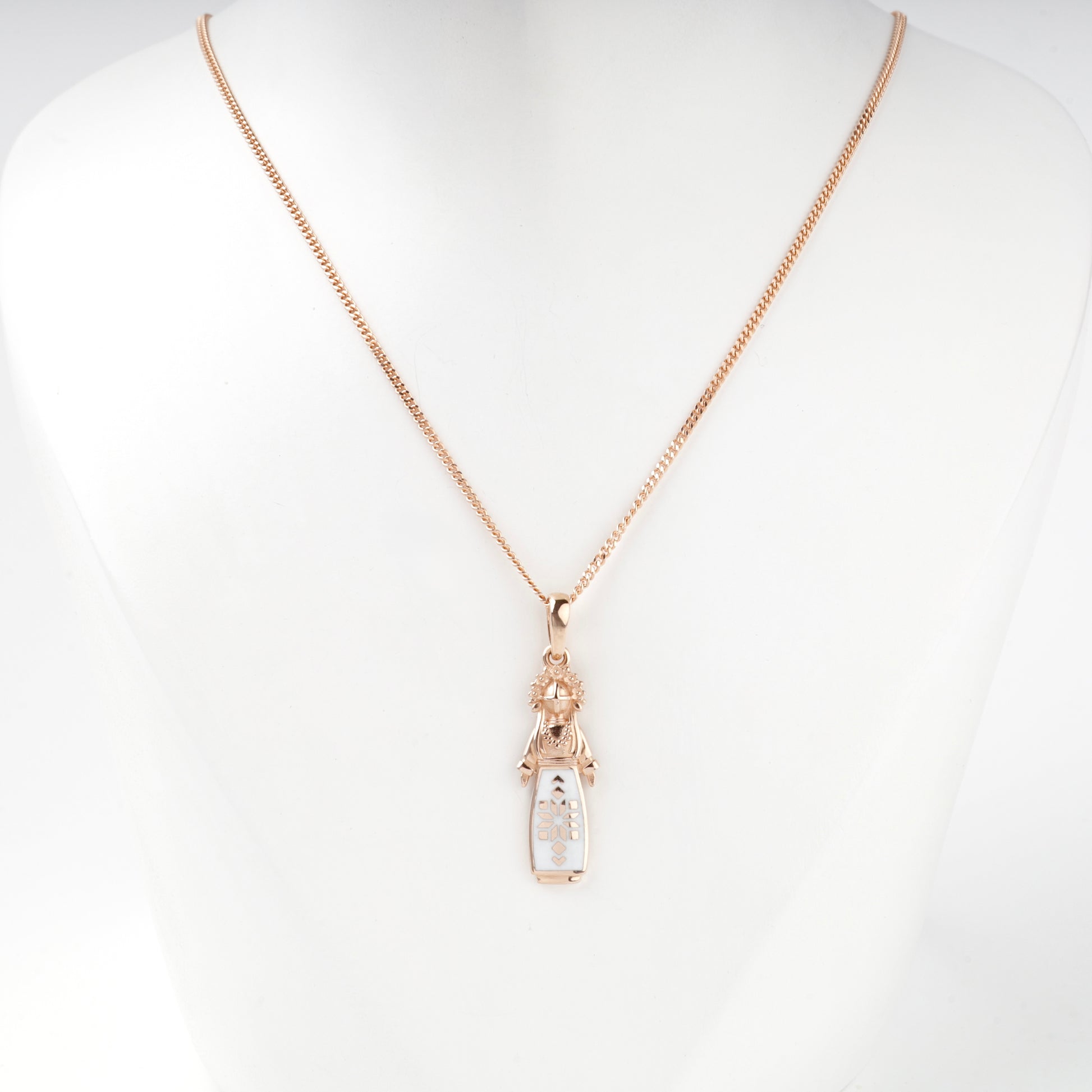 Rose Gold 14K Ukrainian motanka pendant with white enamel, front view