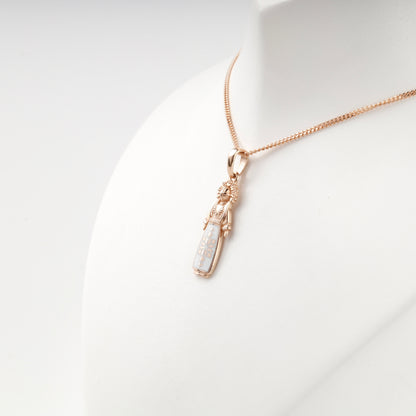 Rose Gold 14K Ukrainian motanka pendant, reverse view