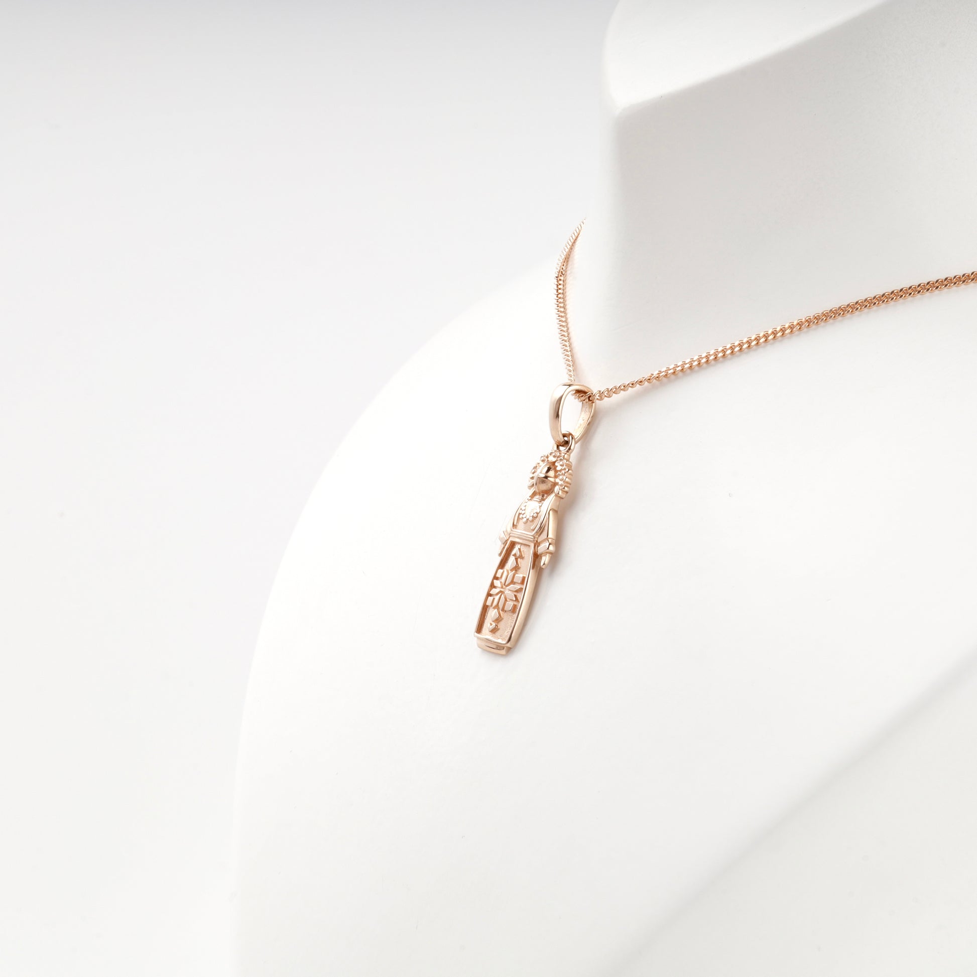 Rose Gold 14K Ukrainian doll pendant, reverse view