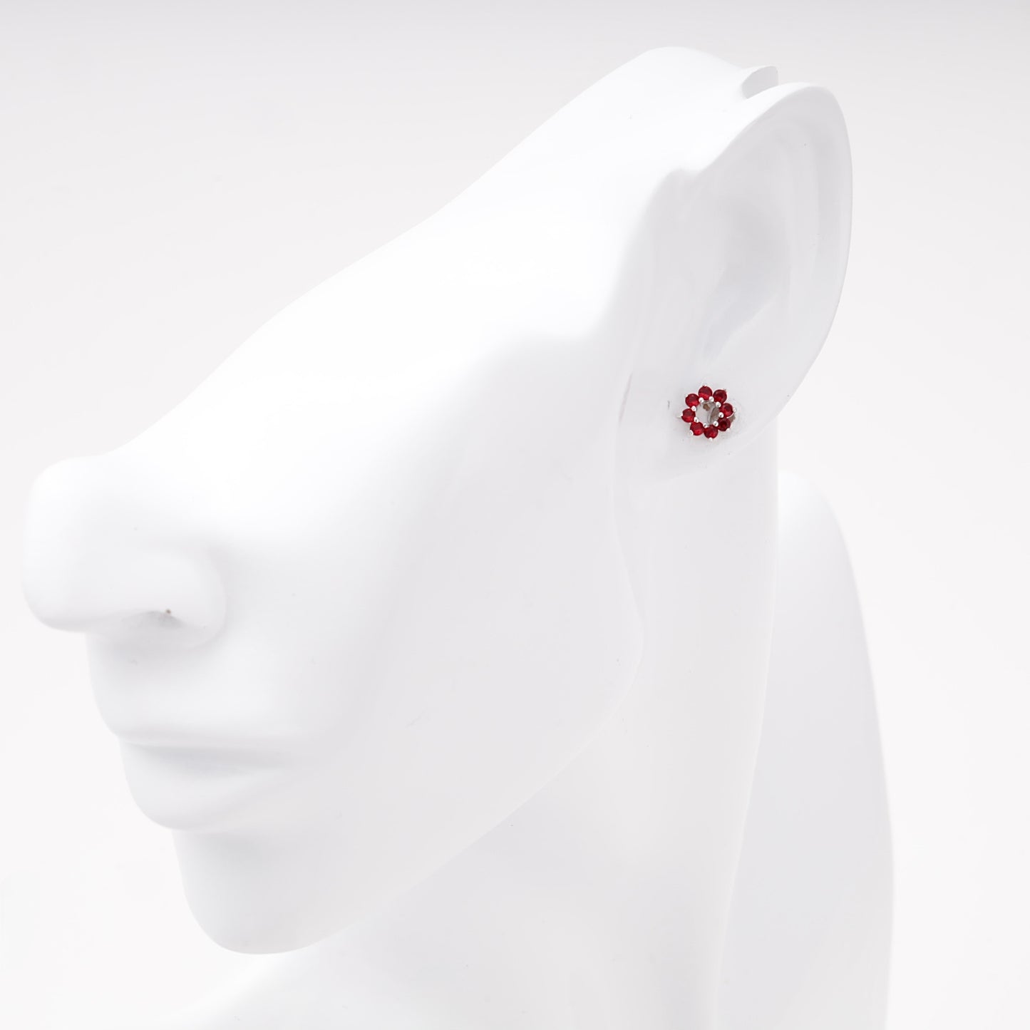 Silver 925 red cubic zirconia stud earring shown on ear — Kabluchka