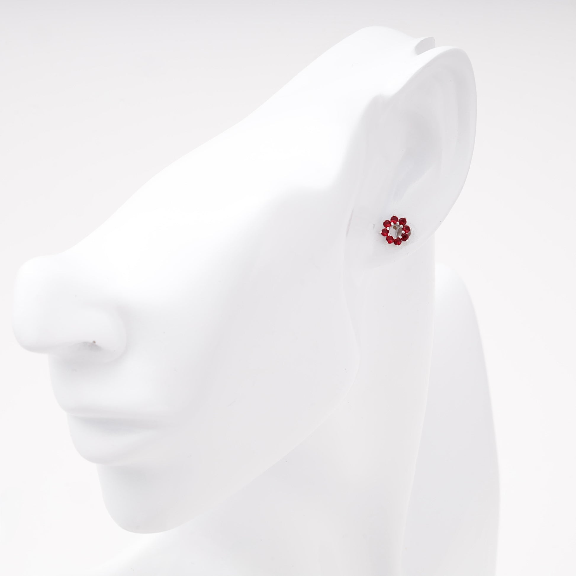Silver 925 red cubic zirconia stud earring shown on ear — Kabluchka