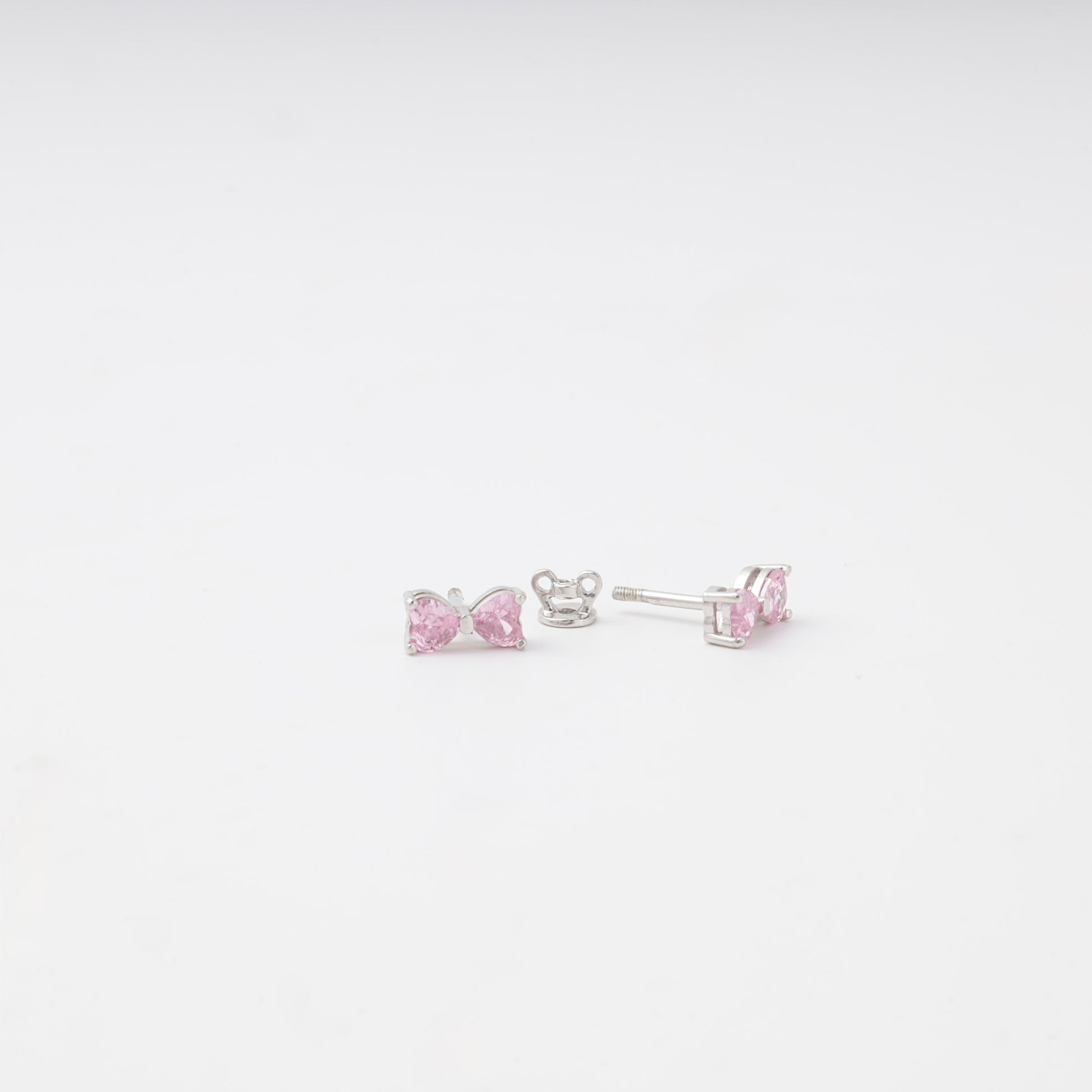 Silver 925 bow stud earrings close-up — Kabluchka