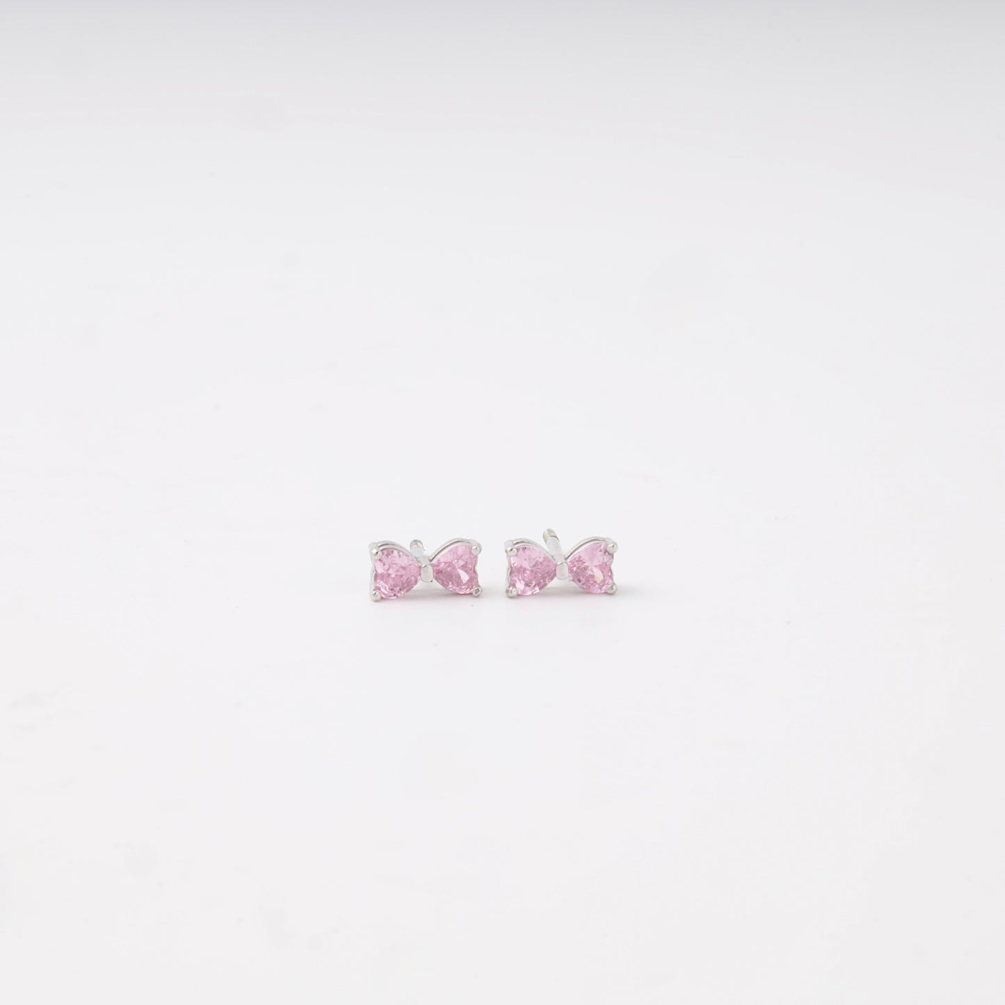 Pink cubic zirconia bow stud earrings in silver 925 — Kabluchka