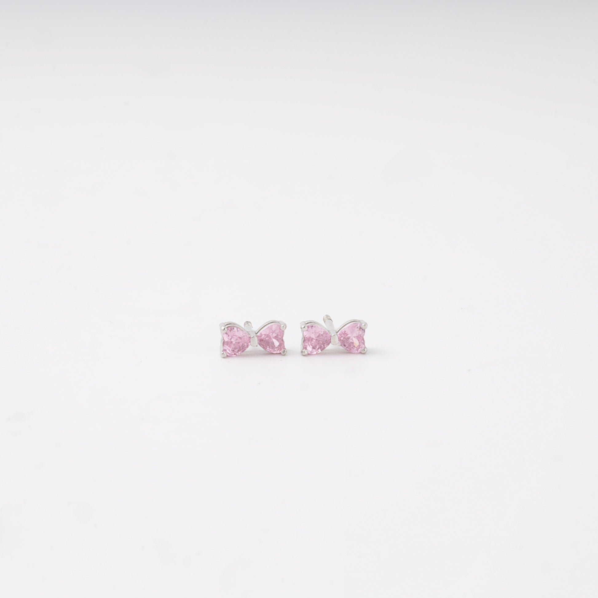Pink cubic zirconia bow stud earrings in silver 925 — Kabluchka