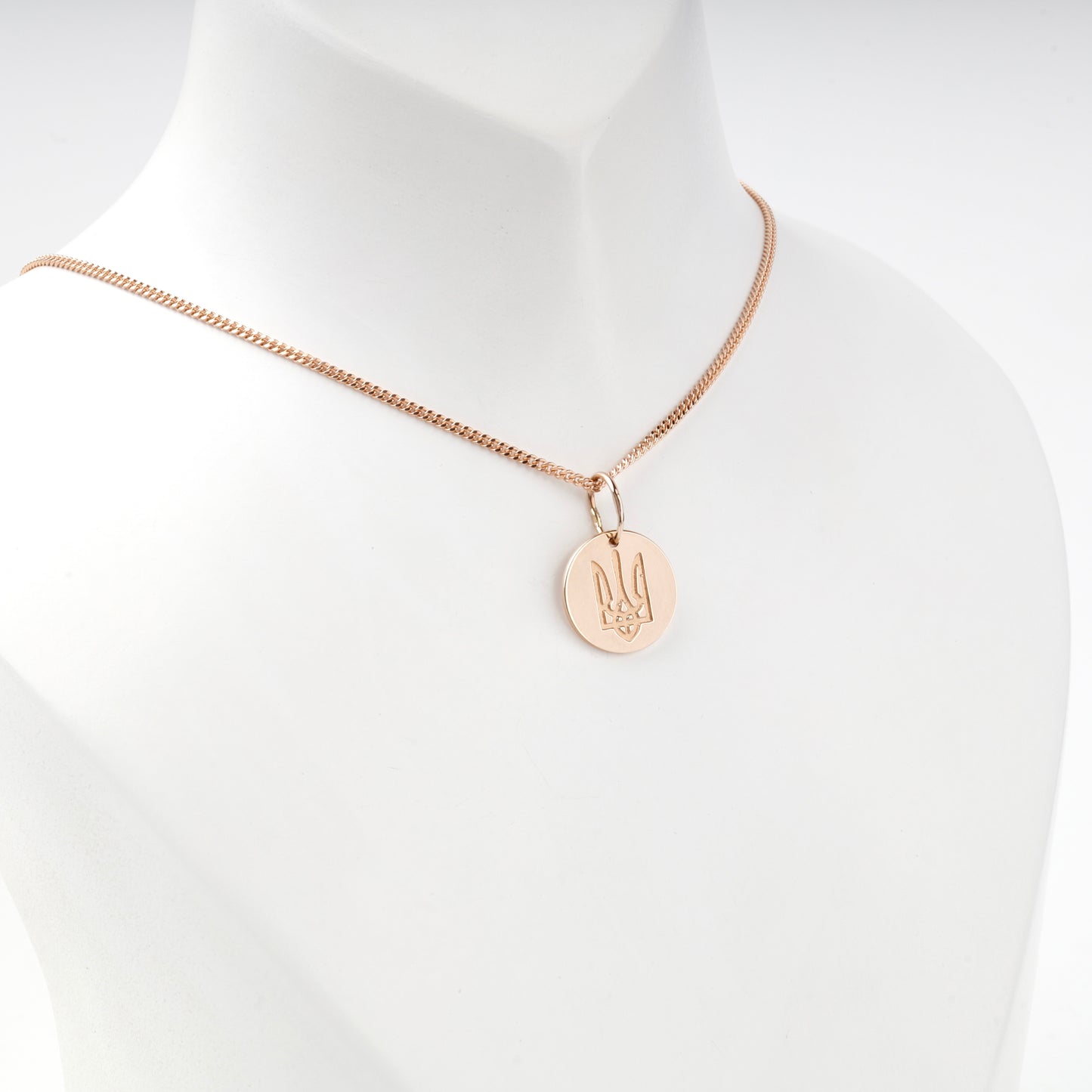 Rose Gold 14K Ukrainian Trident medallion pendant, angled view