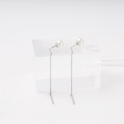 Silver 925 pearl threader earrings on display block — Kabluchka