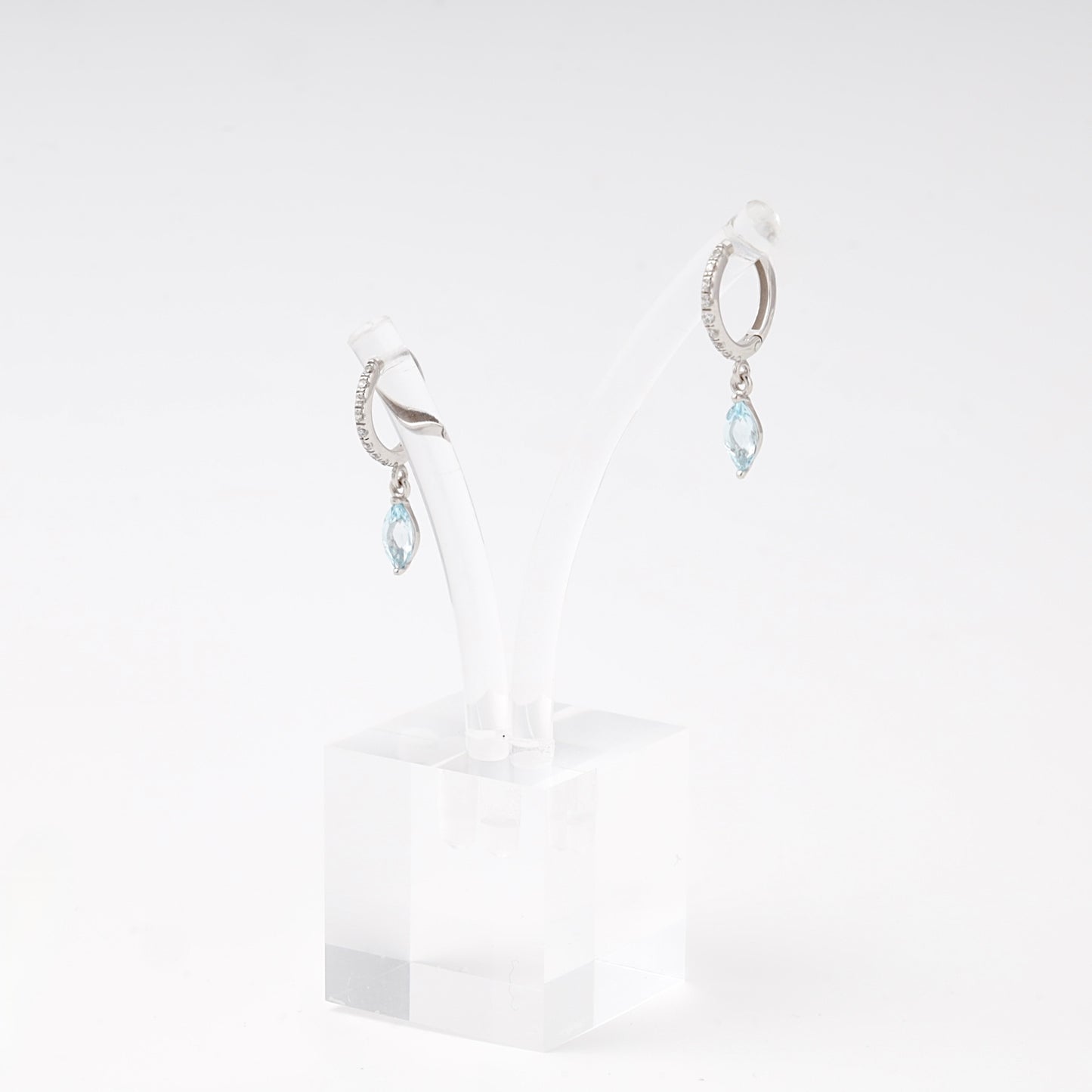 Silver 925 huggie hoop earrings with blue topaz marquise drop — Kabluchka