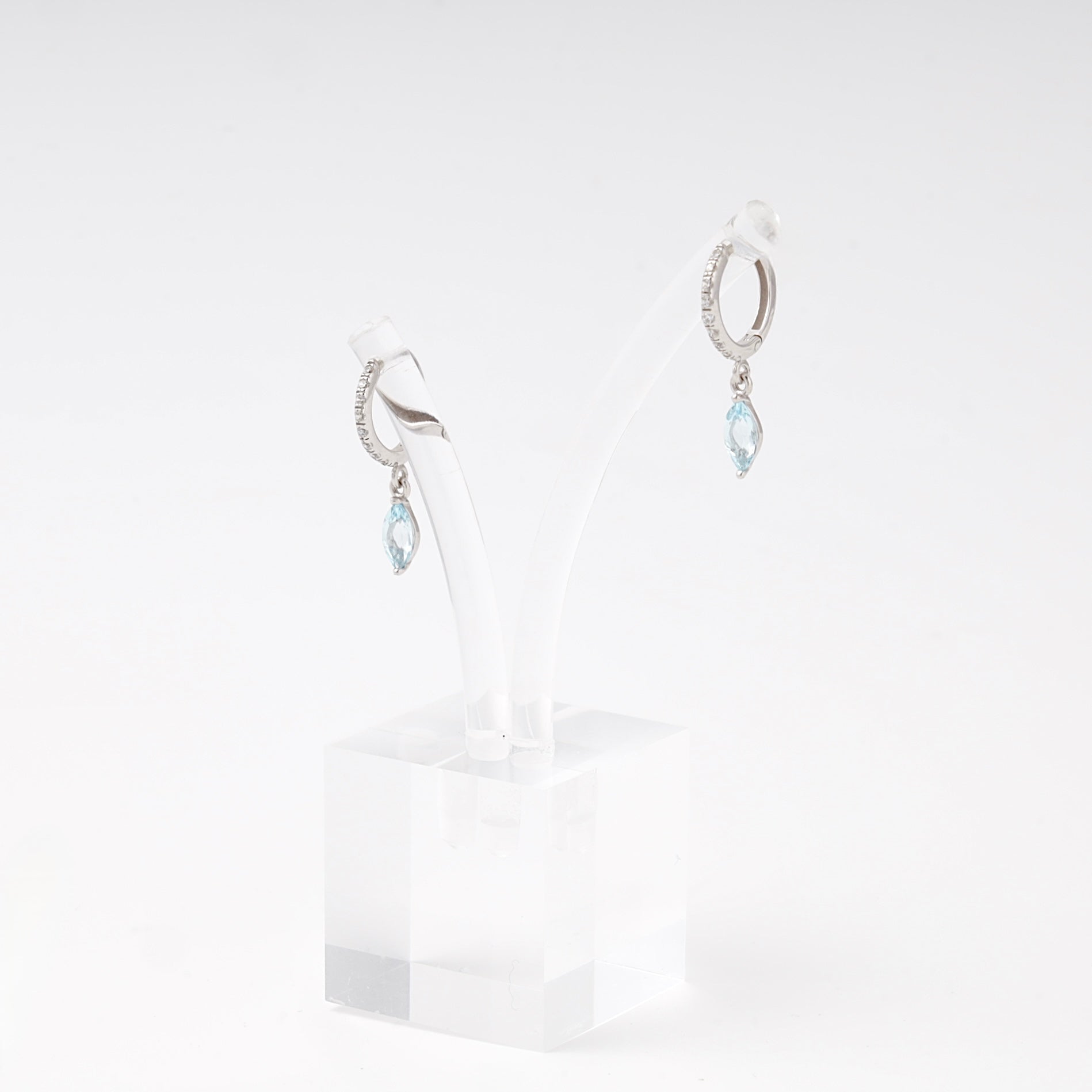 Silver 925 huggie hoop earrings with blue topaz marquise drop — Kabluchka