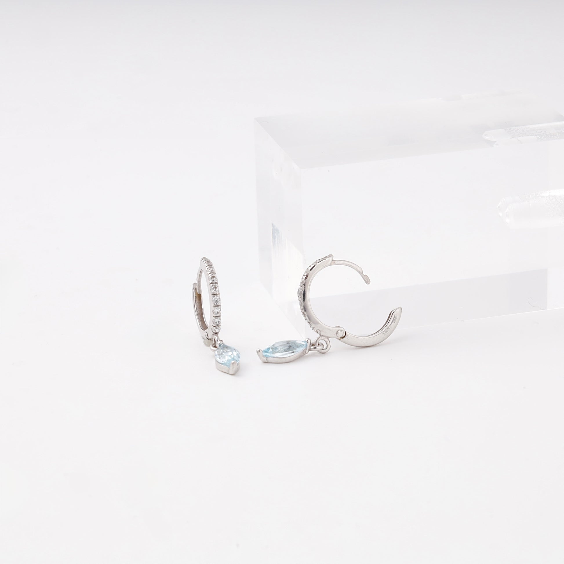 Blue topaz and cubic zirconia silver 925 earrings — Kabluchka