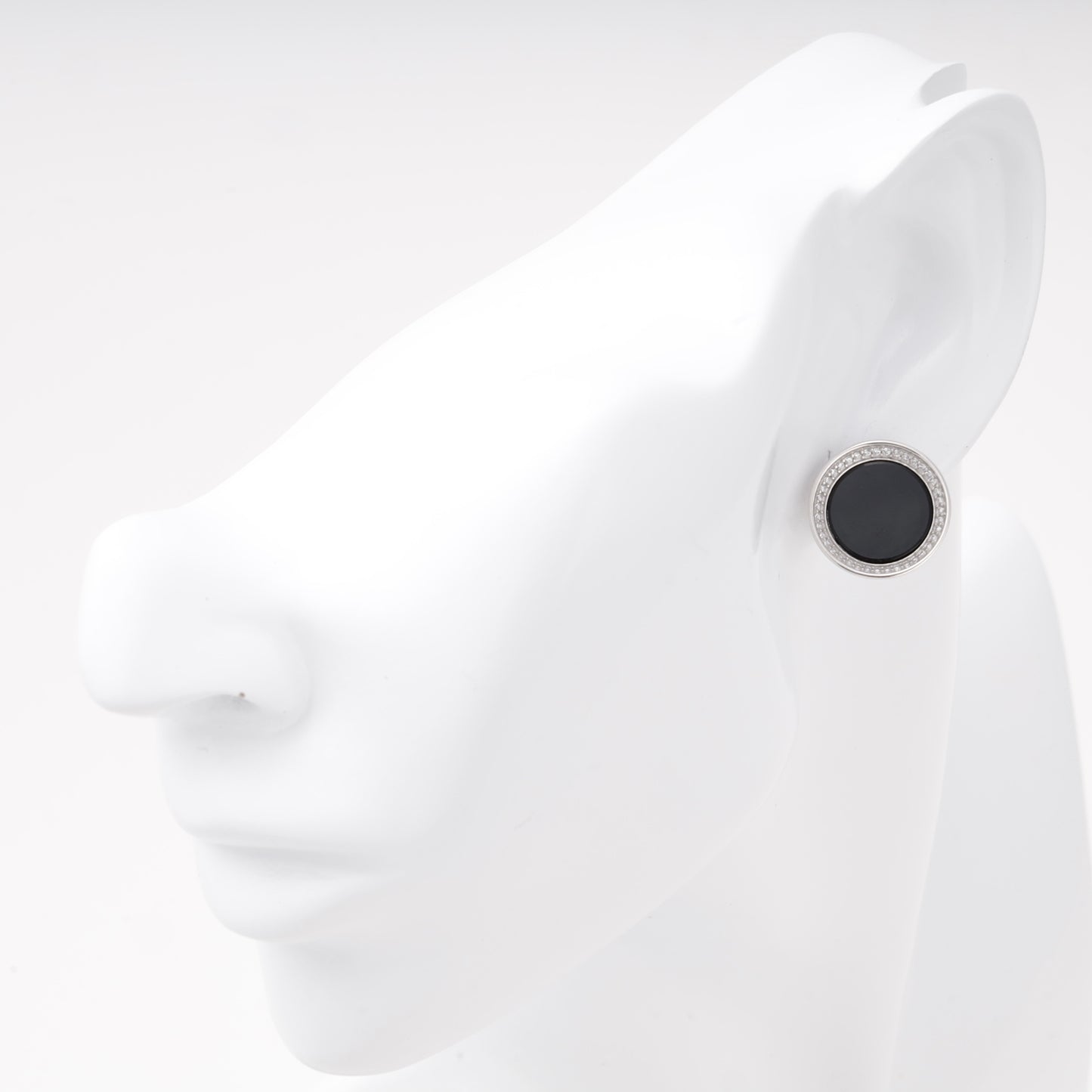 Silver 925 round onyx earring with cubic zirconia halo shown on ear — Kabluchka