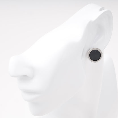 Silver 925 round onyx earring with cubic zirconia halo shown on ear — Kabluchka