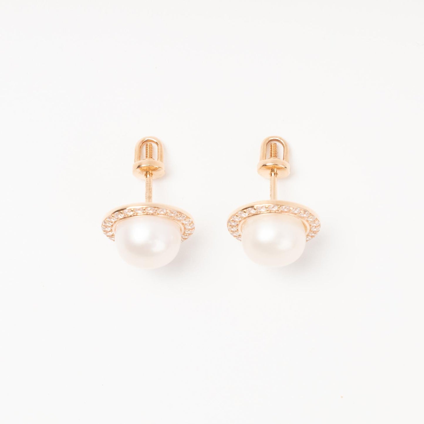 Rose gold pearl earrings cubic zirconia halo on ear | Kabluchka