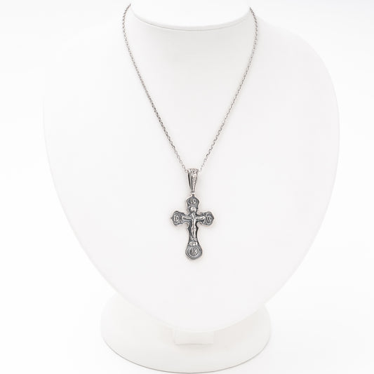 Silver crucifix pendant front view, Kabluchka