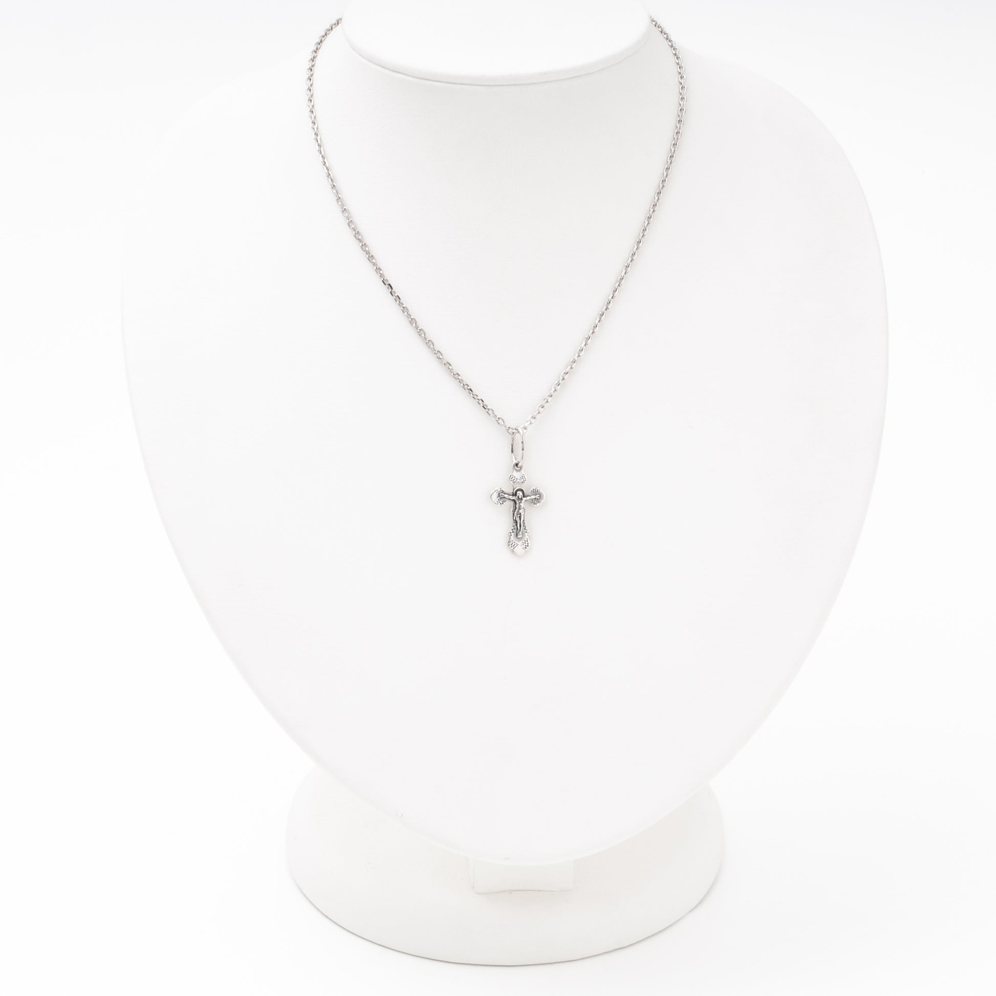 Silver children crucifix pendant front view, Kabluchka