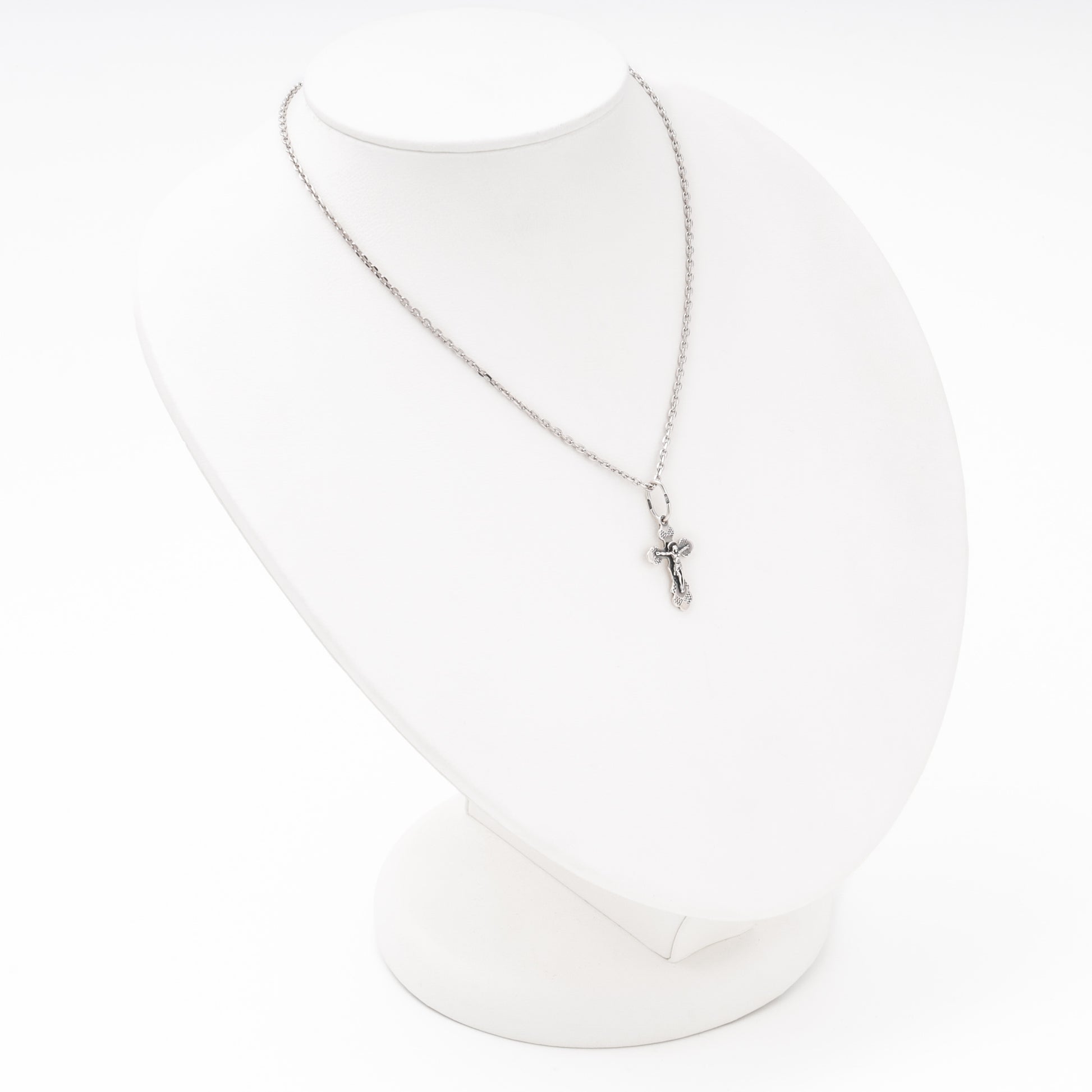 Silver mini cross pendant detail, Kabluchka