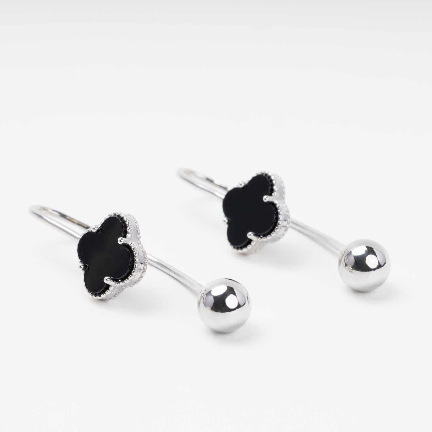 Silver hook earrings with black onyx clover macro shot | Jewelry Store Kabluchka