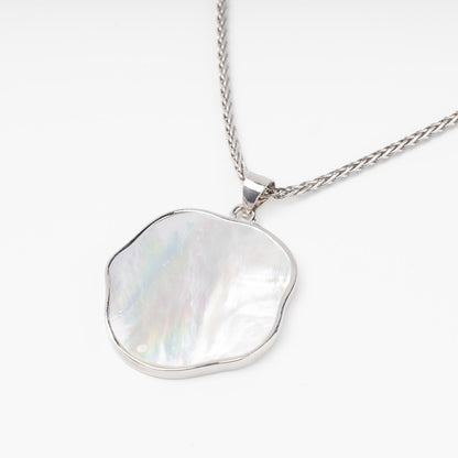 Silver 925 freeform natural mother-of-pearl pendant close-up | Jewelry Store Kabluchka