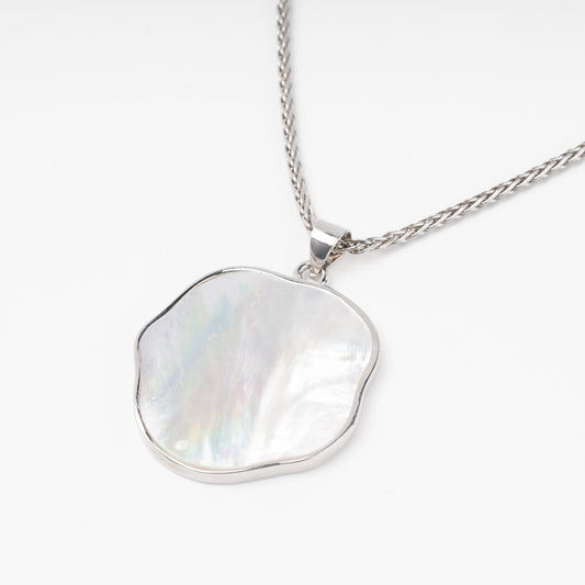 Silver 925 freeform natural mother-of-pearl pendant close-up | Jewelry Store Kabluchka