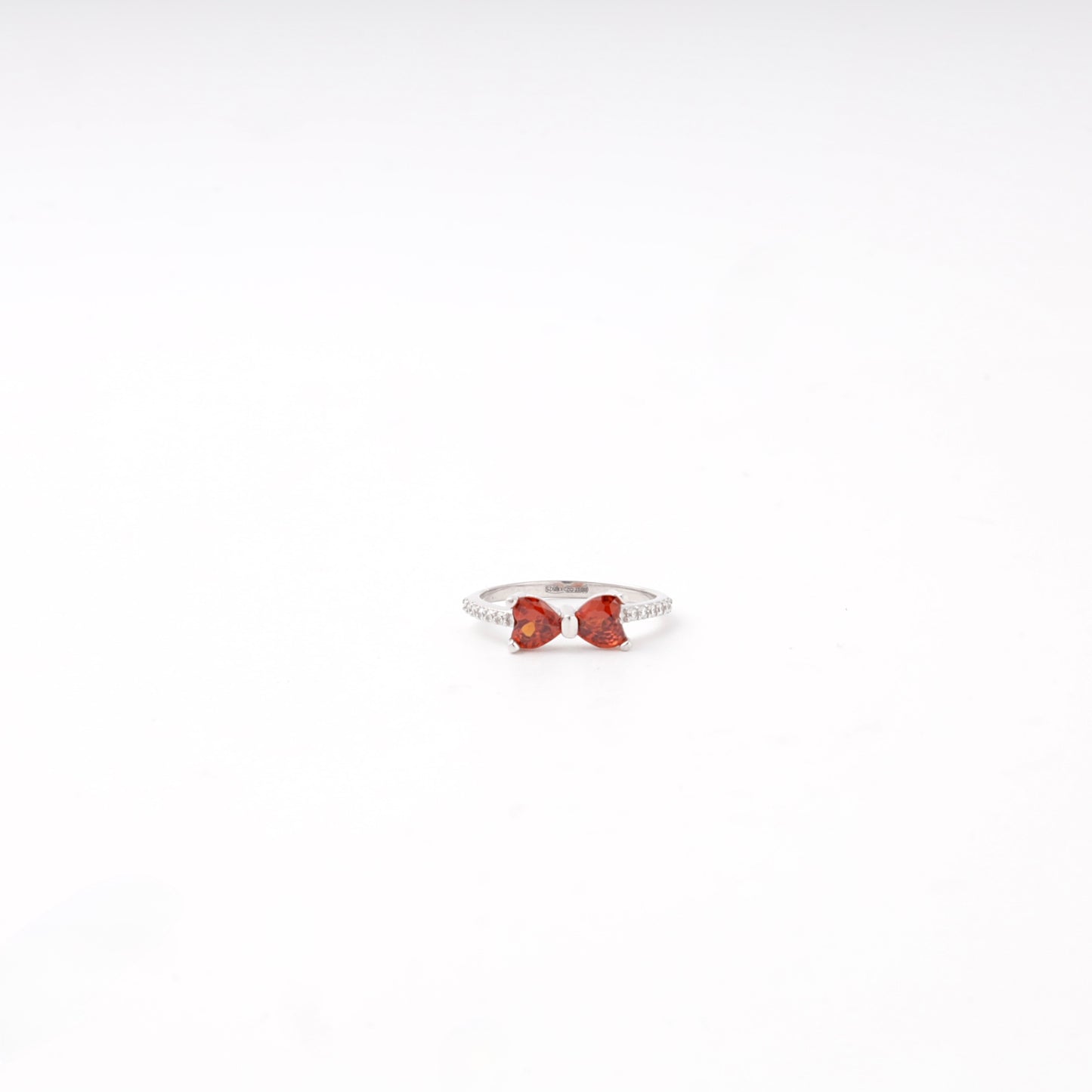 Bow ring with red stones, front view — Kabluchka