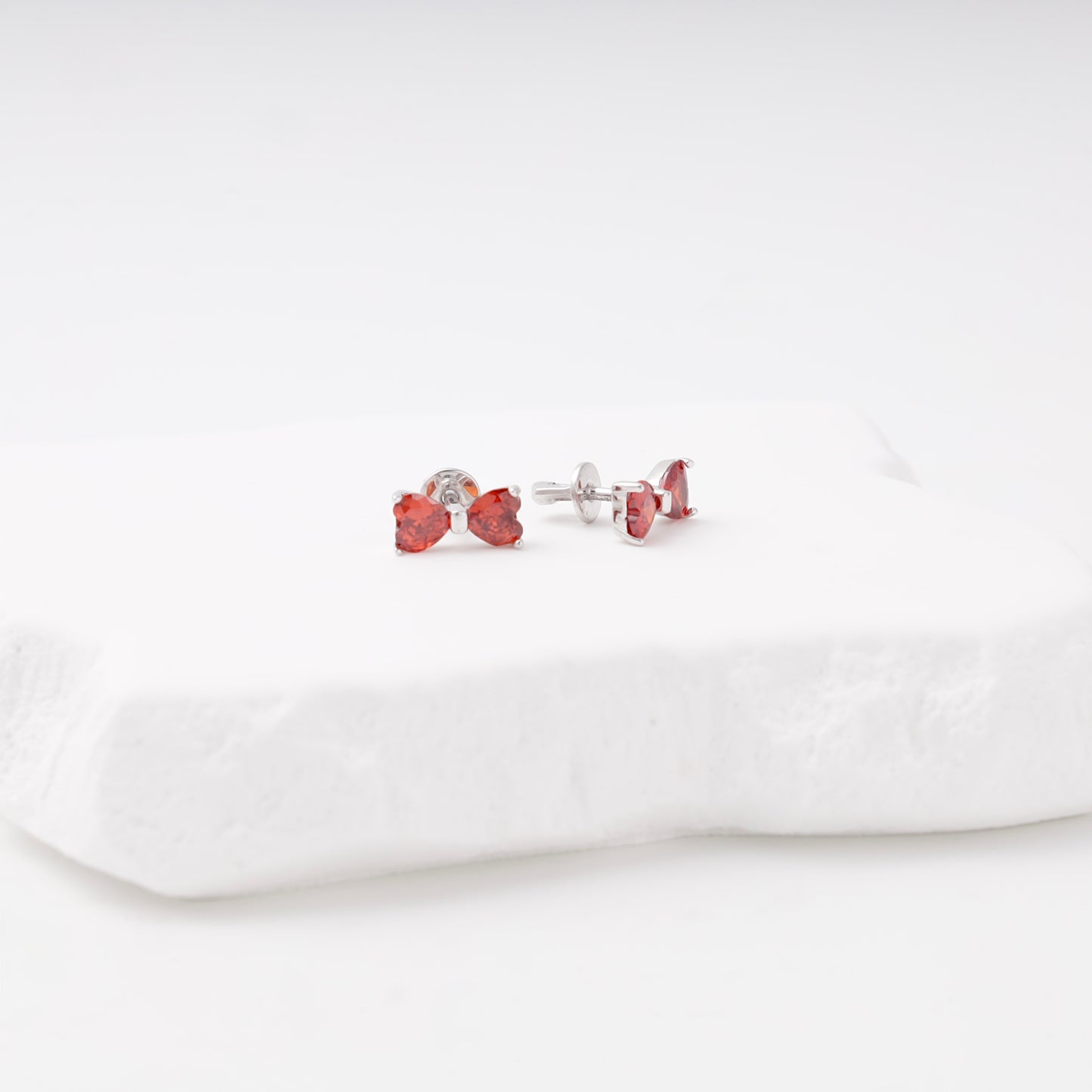 Silver 925 bow earrings, front view — Kabluchka