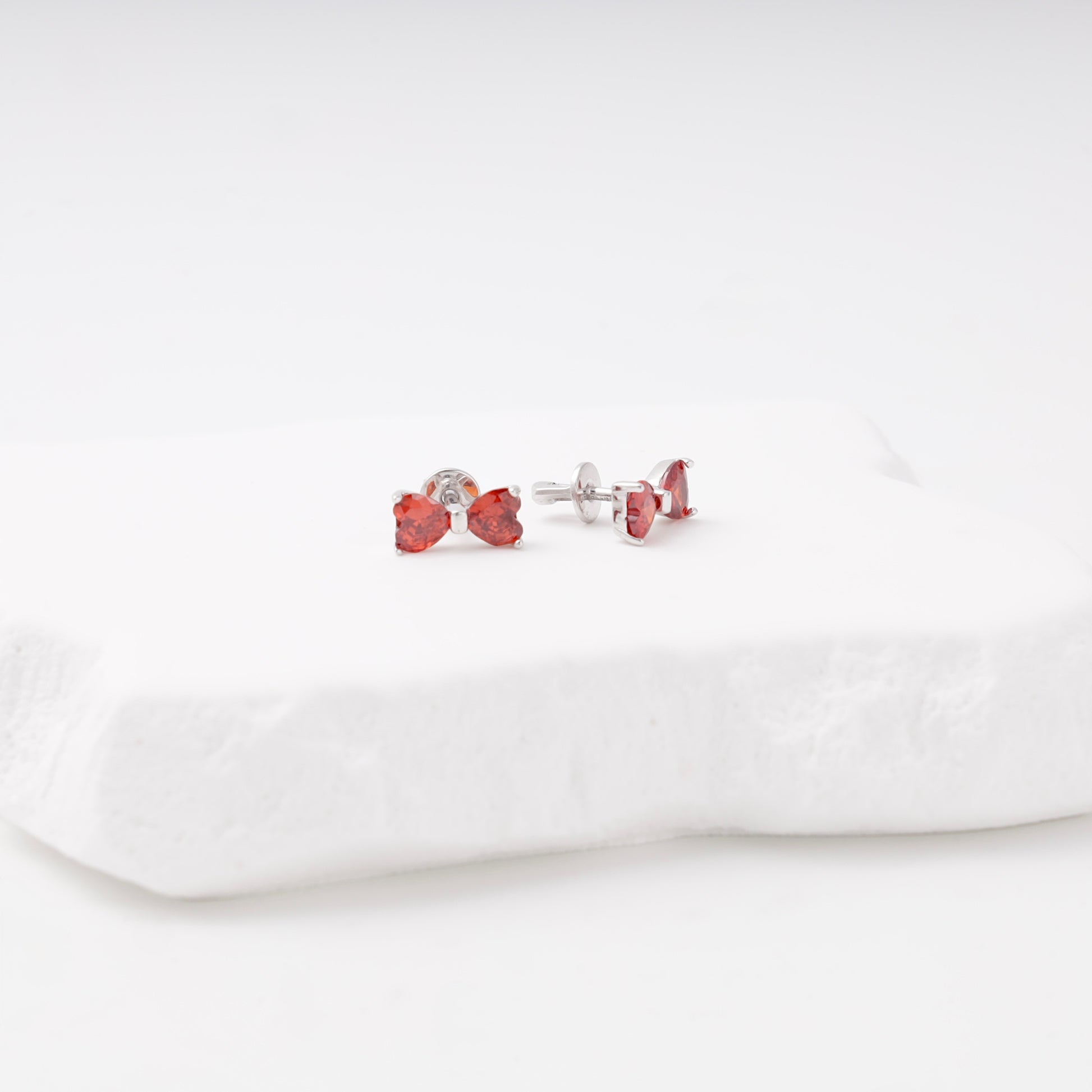 Silver 925 bow earrings, front view — Kabluchka