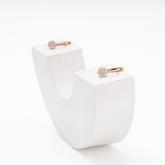 Rose Gold 585 earrings with CZ flower cluster on display — Kabluchka