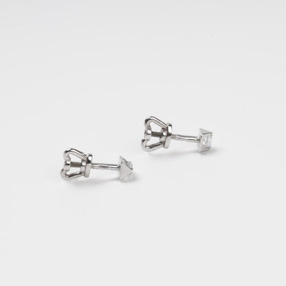 Technical close-up of 14K (585) White Gold stud earrings showing the high-security threaded screw-back post and the smooth white circular inlay.