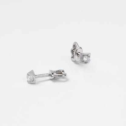 Technical close-up of 14K (585) White Gold stud earrings showing the high-security threaded screw-back post and the smooth white circular inlay.