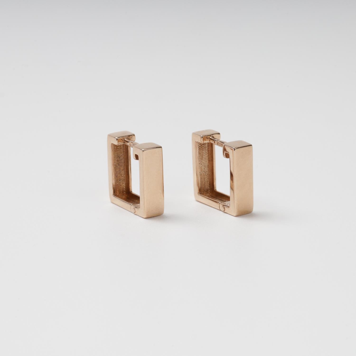Pair of polished 14K (585) Rose Gold geometric earrings showing the architectural rectangular silhouette and high-shine finish.