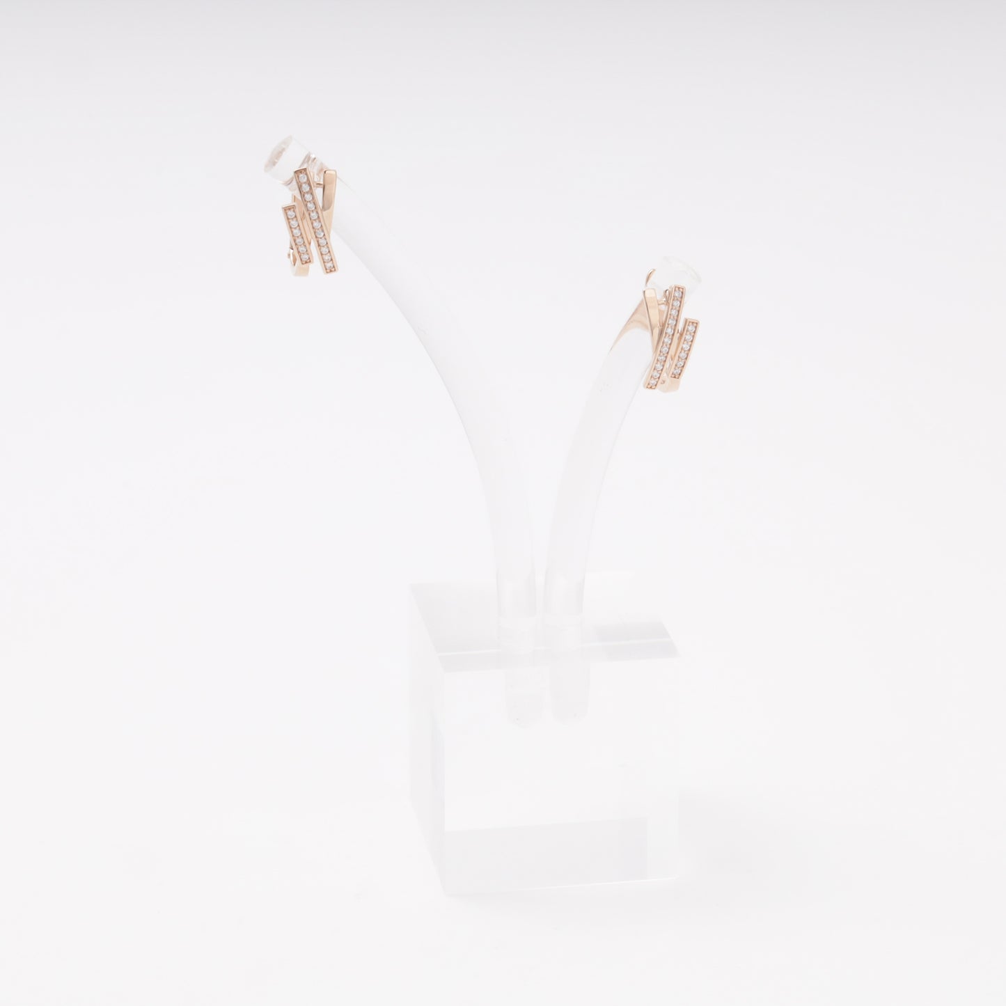 Rose gold 585 double bar earrings with CZ pavé on display stand, front view — Kabluchka