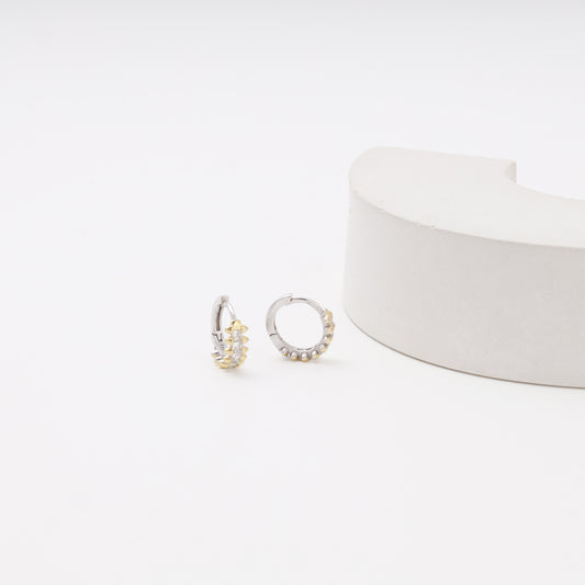 Silver 925 CZ Huggie Earrings flat lay — Kabluchka
