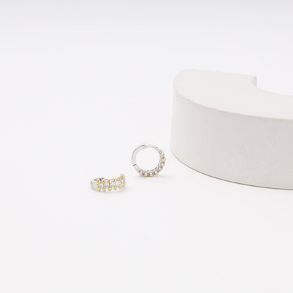 Silver 925 CZ Huggie Earrings on display — Kabluchka