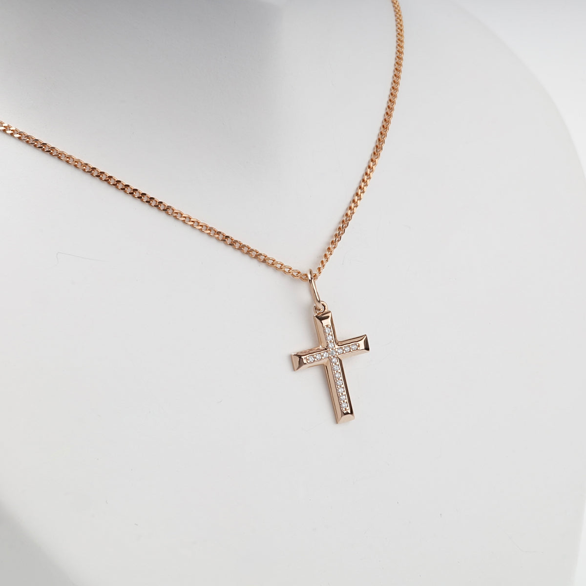 Rose gold cross pendant with clear cubic zirconia on a styling chain — Kabluchka