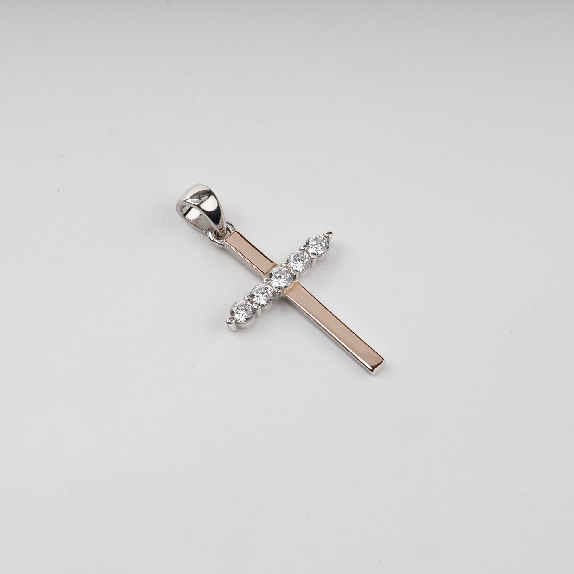 Rhodium-plated Silver 925 and Gold 375 cubic zirconia cross pendant — front view — Kabluchka