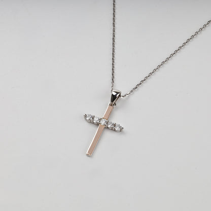Rhodium-plated Silver 925 and Gold 375 cubic zirconia cross pendant — styled on chain — Kabluchka