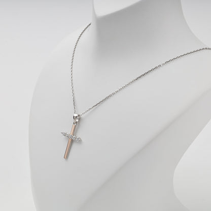 Rhodium-plated Silver 925 and Gold 375 cubic zirconia cross pendant — angled view — Kabluchka