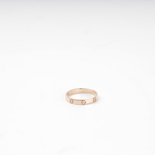 Rose gold 585 screw-motif band ring, flat view — Kabluchka