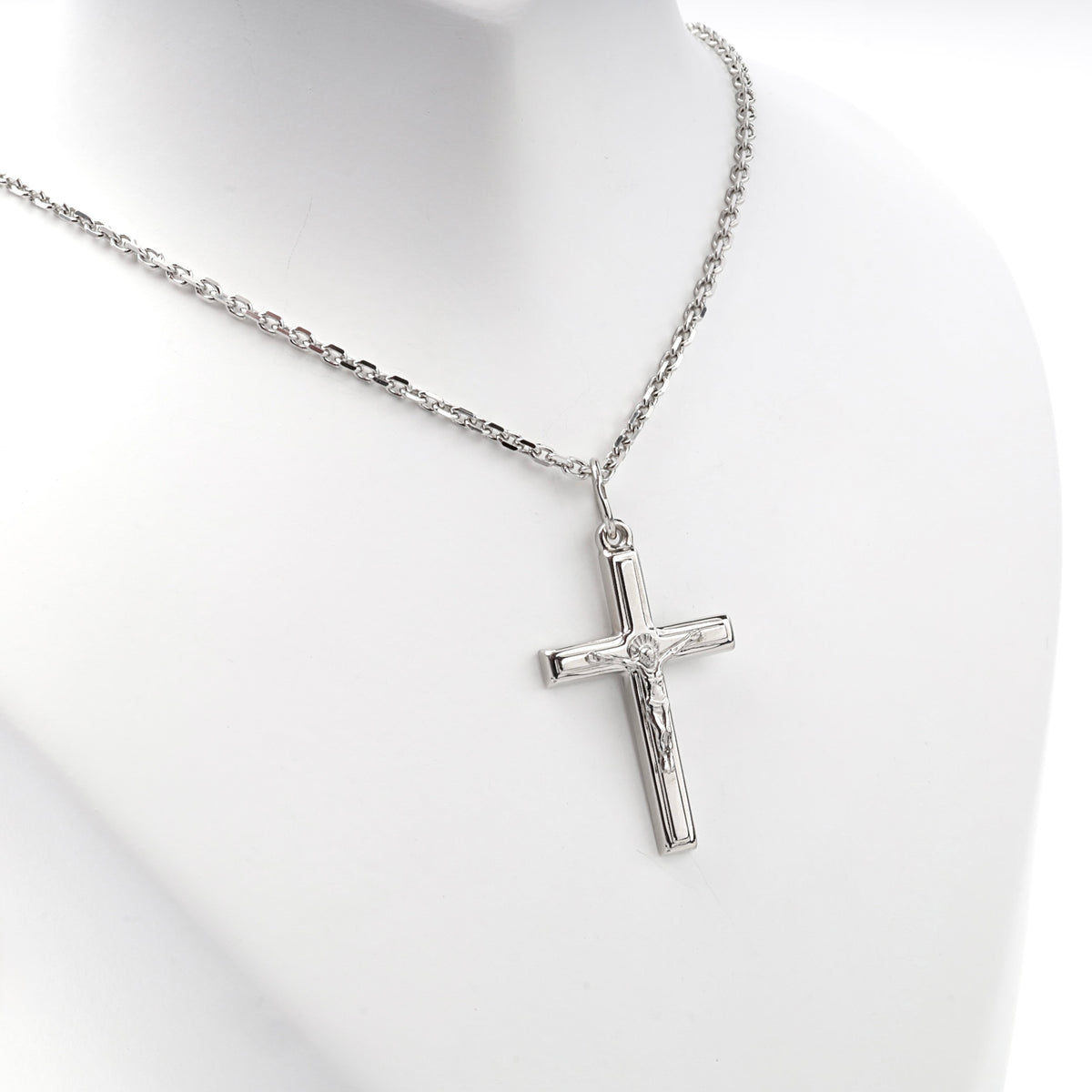 Silver 925 engraved open-frame crucifix pendant, angled view