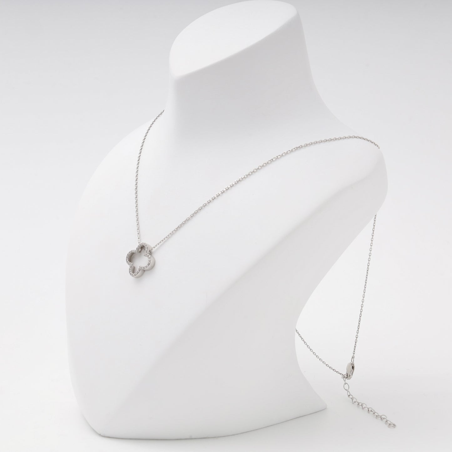 Silver 925 open clover pendant necklace shown on a bust — Kabluchka