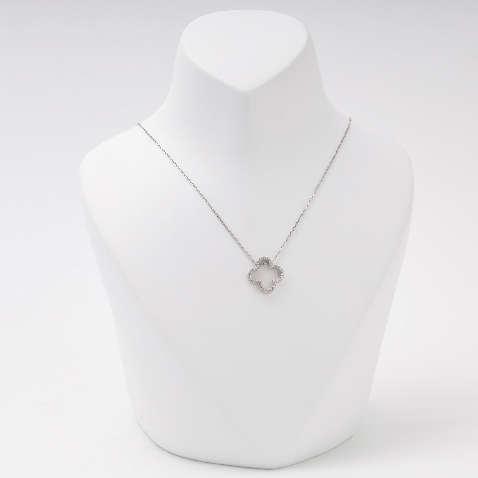 Silver 925 open clover pendant necklace with cubic zirconia on a bust — Kabluchka