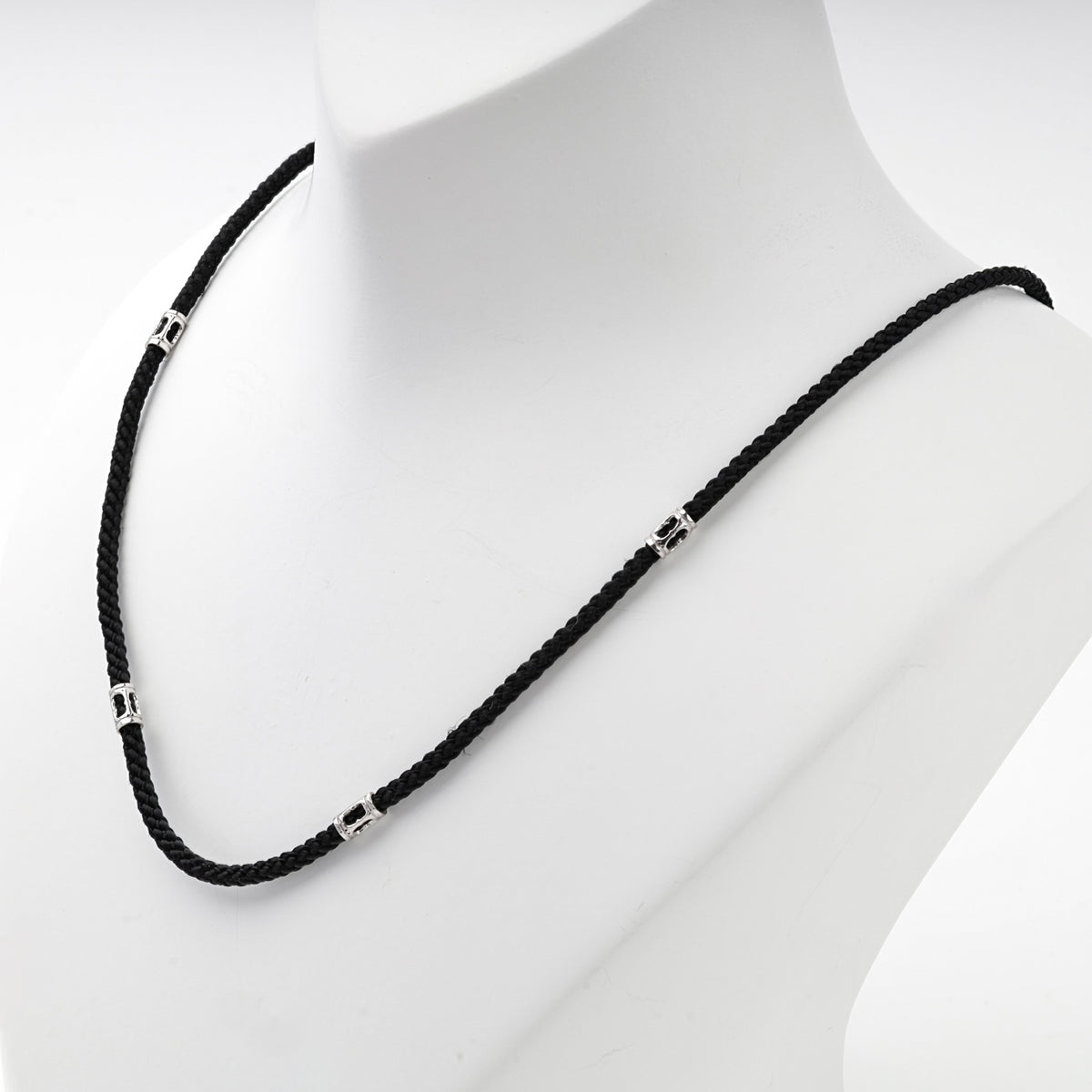 Black braided cord necklace with silver 925 spacer beads, back view