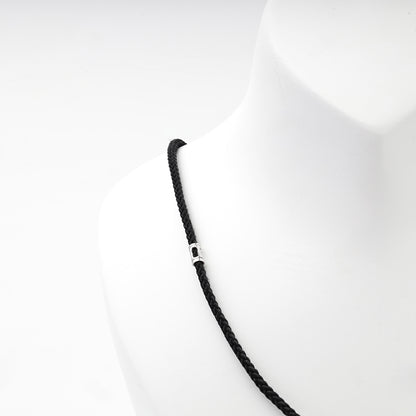 Black braided cord necklace with silver 925 spacer beads, product label