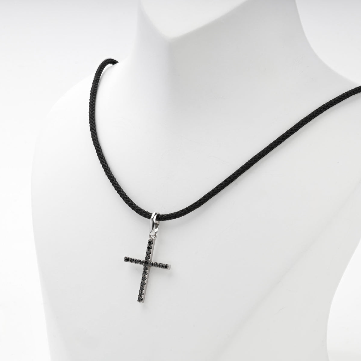 Silver 925 cross pendant with black cubic zirconia, side view