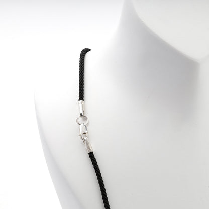 Black braided cord necklace with silver 925 clasp, angled view