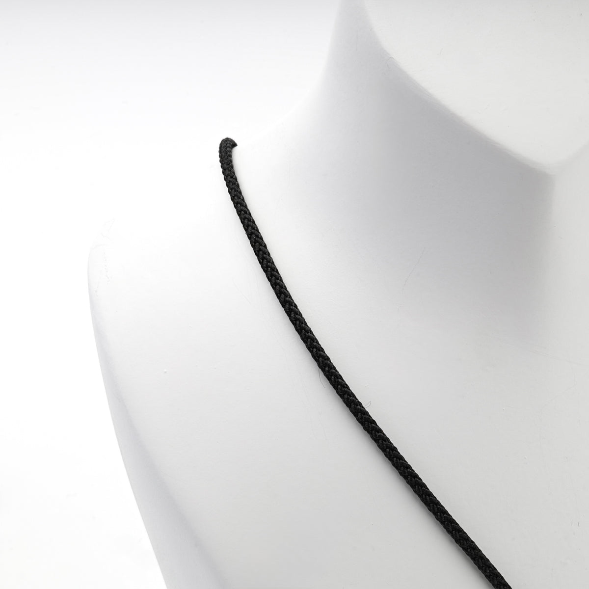 Black braided cord necklace with silver 925 clasp, close-up detail