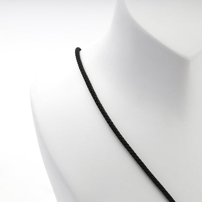 Black braided cord necklace with silver 925 clasp, close-up detail