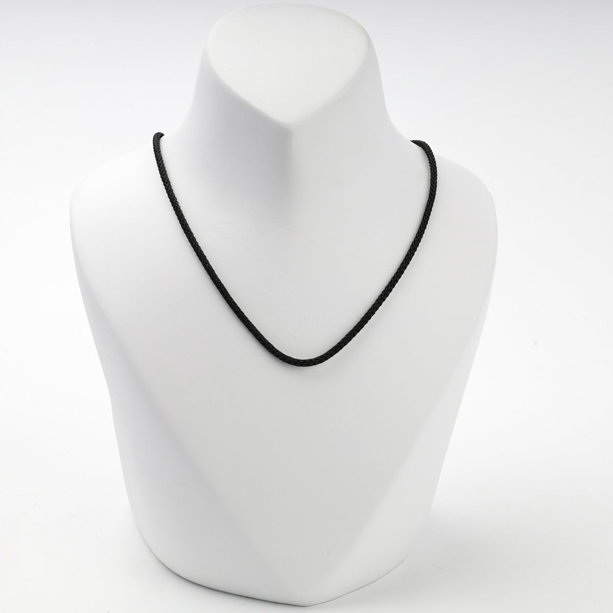 Black braided cord necklace with silver 925 clasp, front view