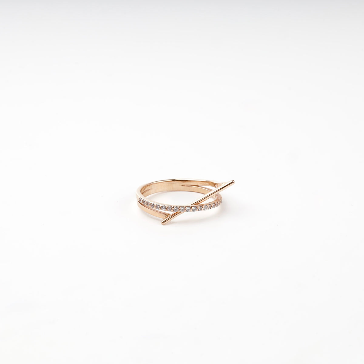 Rose gold cubic zirconia crossing ring — Kabluchka