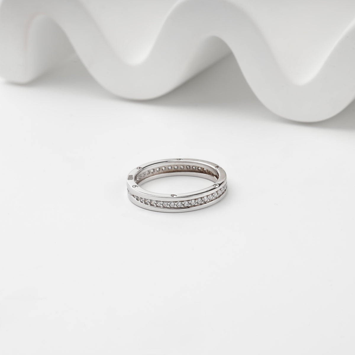 White gold cubic zirconia channel ring front view